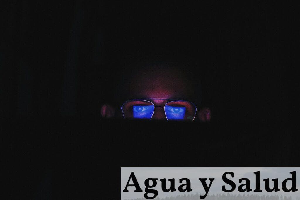 person wearing black framed eyeglasses